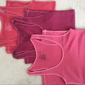 Three American Eagle tank tops